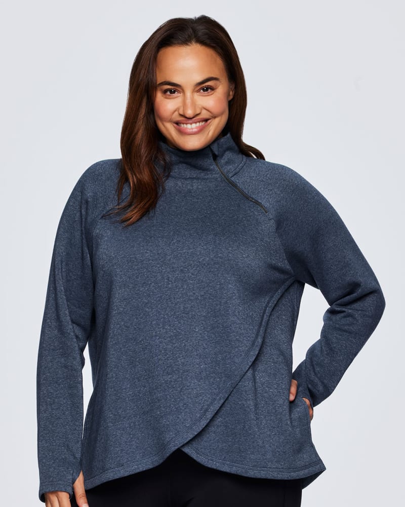 Front of a model wearing a size 2X Plus Prime Ready To Roll Fleece Zip Mock Neck Pullover in Blue by RBX Active. | dia_product_style_image_id:316086